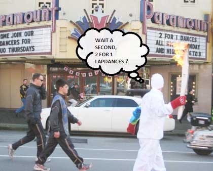 Olympic Torch Passes the Paramount